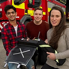 a group of people posing for the camera