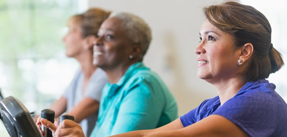 a group of people looking at a phone