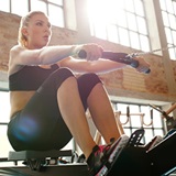 a woman sitting on a bed