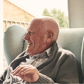Elderly man in chair