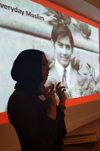 a person standing in front of a wall