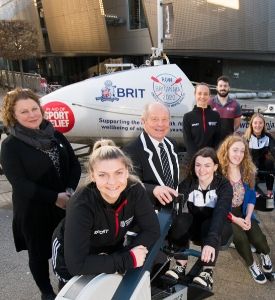 a group of people posing for the camera