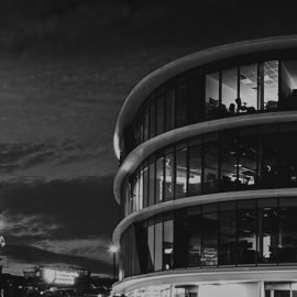 a double decker bus driving down a street