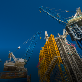 tall building and cranes