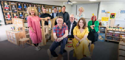 group of people smiling to the camera