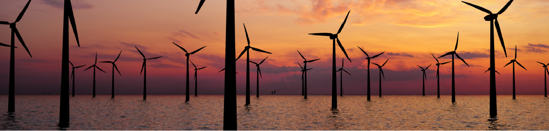 wind turbines at sunset