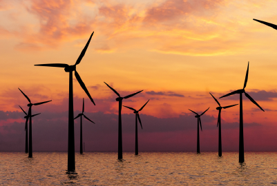 wind turbines at sunset