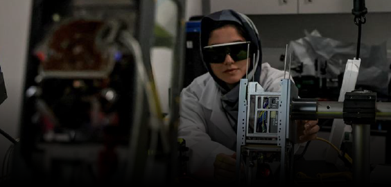 two men smiling to camera