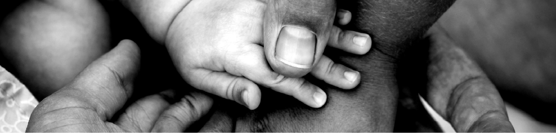 hand holding a babies hand