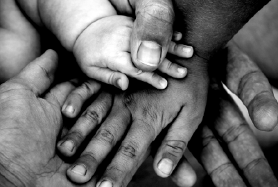 hand holding a babies hand