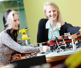a woman sitting at a table