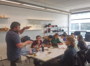 Caption:Leven Brown pictured with Design for Industry students