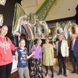 a group of people posing for the camera