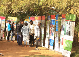 Caption: Photographs taken by young refugees were turned into a travelling exhibition which has already been staged at universities and refugee settlements in Uganda.