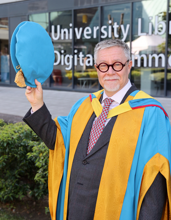 Caption: Tim Brown CBE.