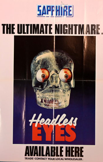 Caption: Posters for films including The Headless Eyes (1971), an American horror film written and directed by Kent Bateman are part of the group's collection of memorabilia.