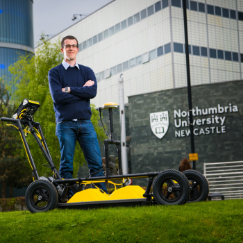 Caption: Dr Craig Warren is pictured with a Ground Penetrating Radar (GPR) system manufactured by Sensors & Software. The gprMax software can be used to inform interpretations of GPR data from systems such as this.