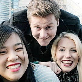 a group of people posing for the camera