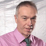 a man wearing a suit and tie