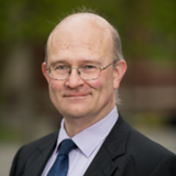 a man wearing a suit and tie