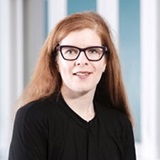 a person standing in front of a window