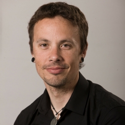 a man smiling for the camera