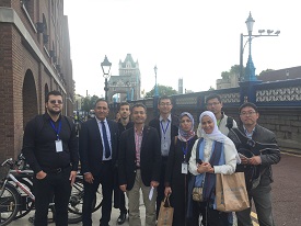 a group of people posing for a photo