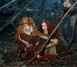 a group of people sitting posing for the camera