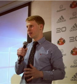 a man wearing a suit and tie