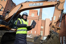 a person standing in front of a building