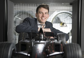 a man standing in front of a window