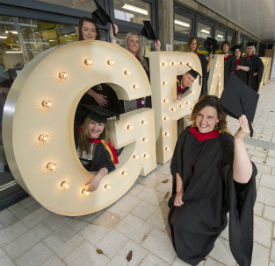 a group of people posing for the camera