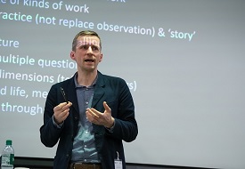 a man holding a sign