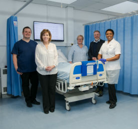 a group of people standing in a room