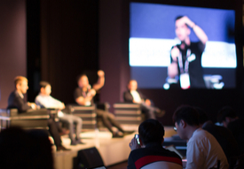 a group of people sitting at a table