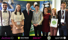 a group of people posing for a photo