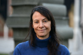 a woman in a blue shirt