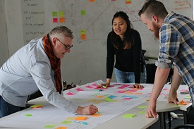 a group of people sitting at a table