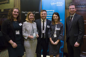 a group of people posing for a photo