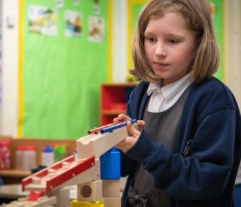 a person holding a toy