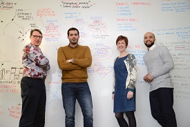 a group of people posing for the camera