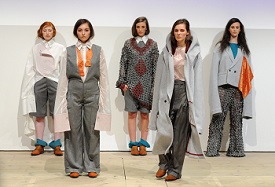 a group of people posing for the camera