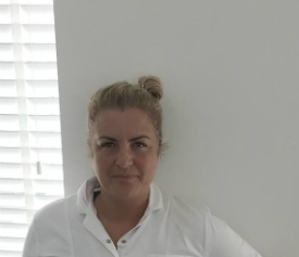 a person smiling for the camera