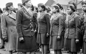 a group of people in uniform posing for a photo