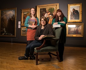 a group of people sitting in a room