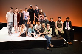 a group of people posing for the camera