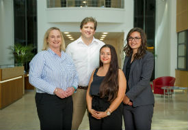 a group of people posing for the camera