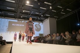 a group of people standing in a room