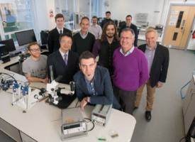 a group of people posing for the camera