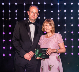 a man and a woman posing for a picture